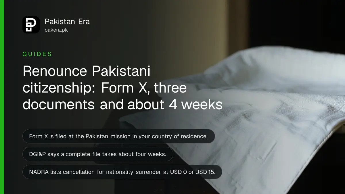 A folded white cloth on a dark wooden table, for an article on renounce pakistani citizenship