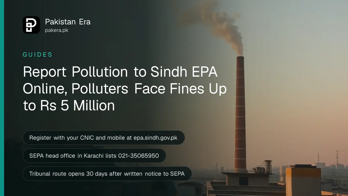 Grey smoke rising from an industrial chimney over low rooftops in Karachi at dusk