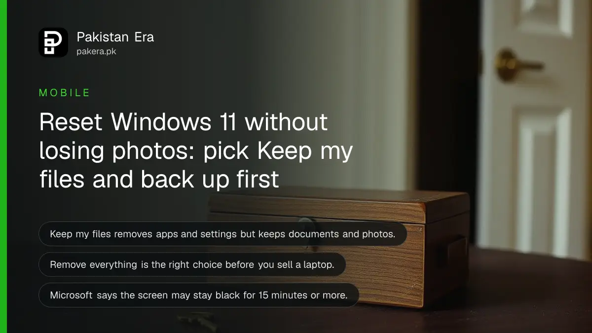 A closed wooden box and a brass key on a dark wooden table, for a guide to resetting Windows 11