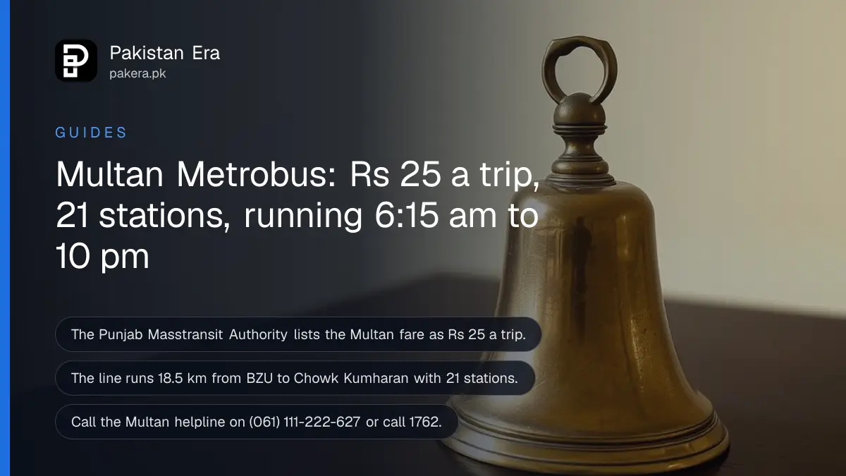 A brass bell on a dark wooden table, for a guide to riding the Multan Metrobus