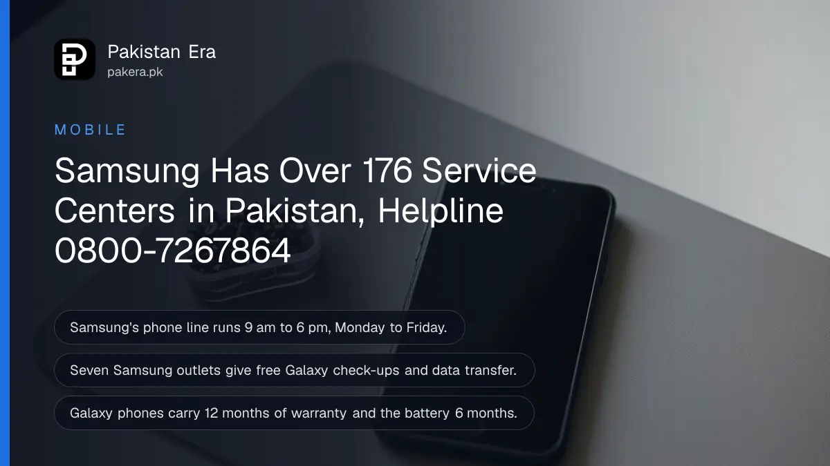 A smartphone with a dark screen on a plain grey mat on a service counter beside a small tray of tiny screws