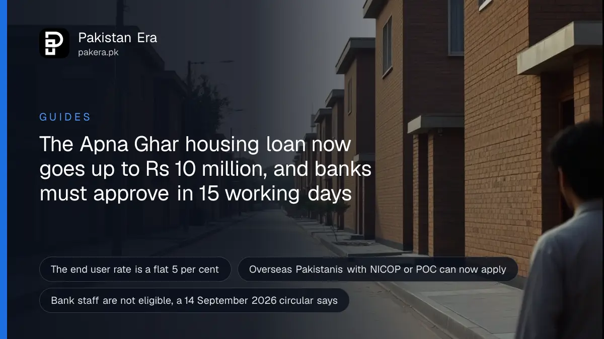 A row of new brick houses with flat roofs on a quiet Lahore street in soft afternoon light