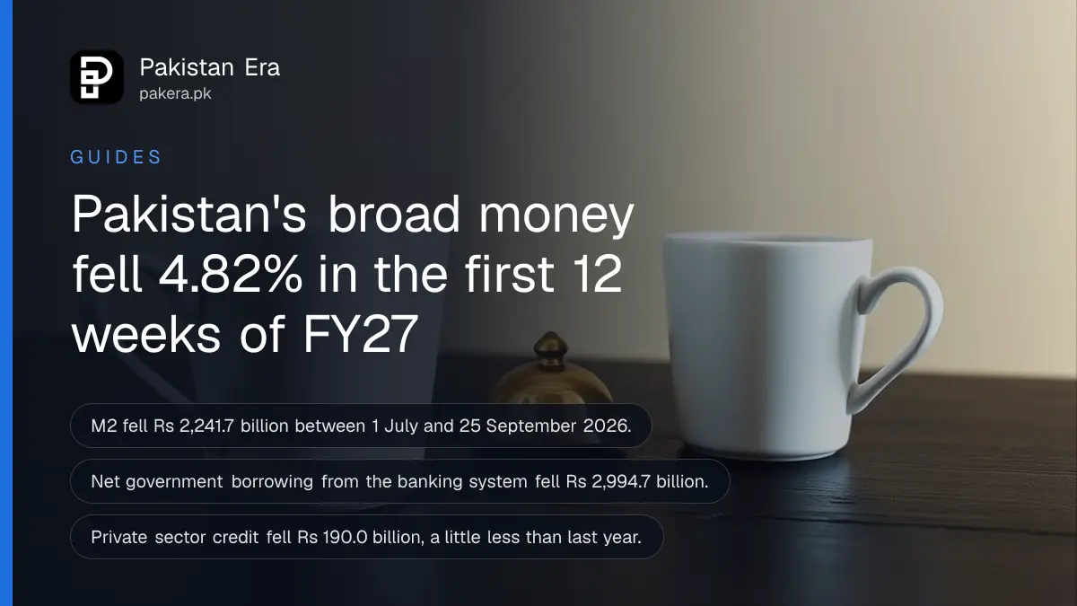 Two plain white cups and a small brass bell on a dark wooden table against a plain cream wall, for a story on the money supply
