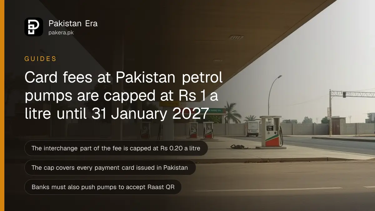 An empty petrol station forecourt with a row of fuel pumps under a canopy on a Lahore road in clear morning light