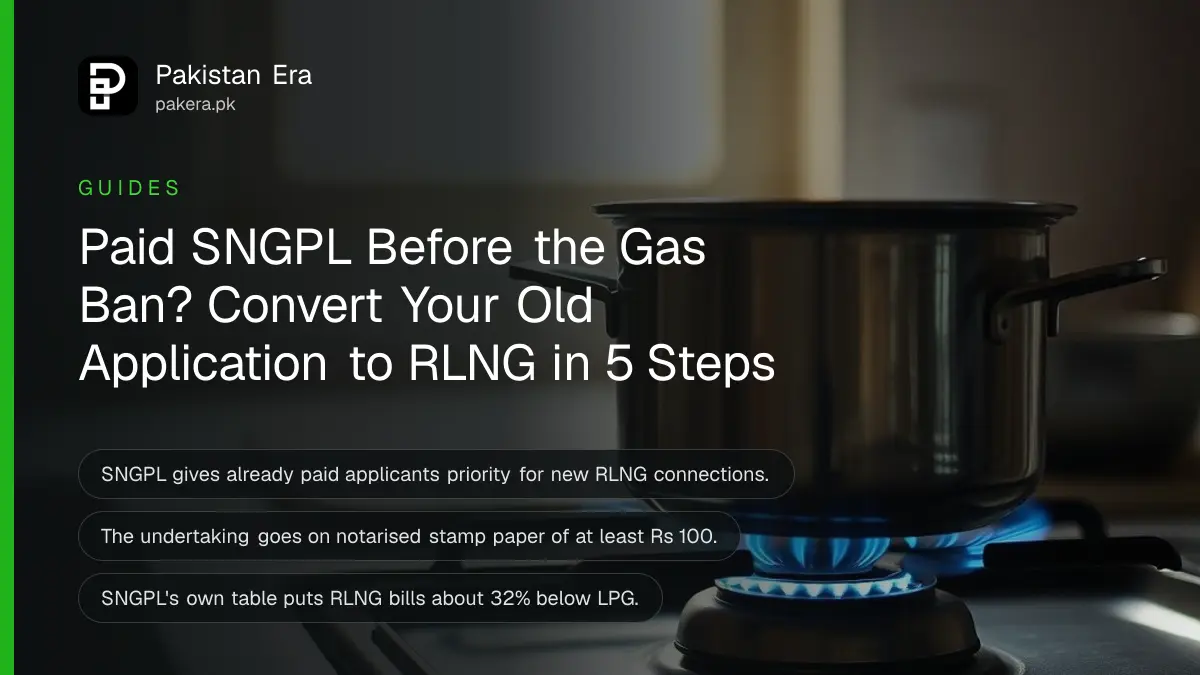 A blue gas flame on a kitchen stove in a quiet home kitchen in the evening