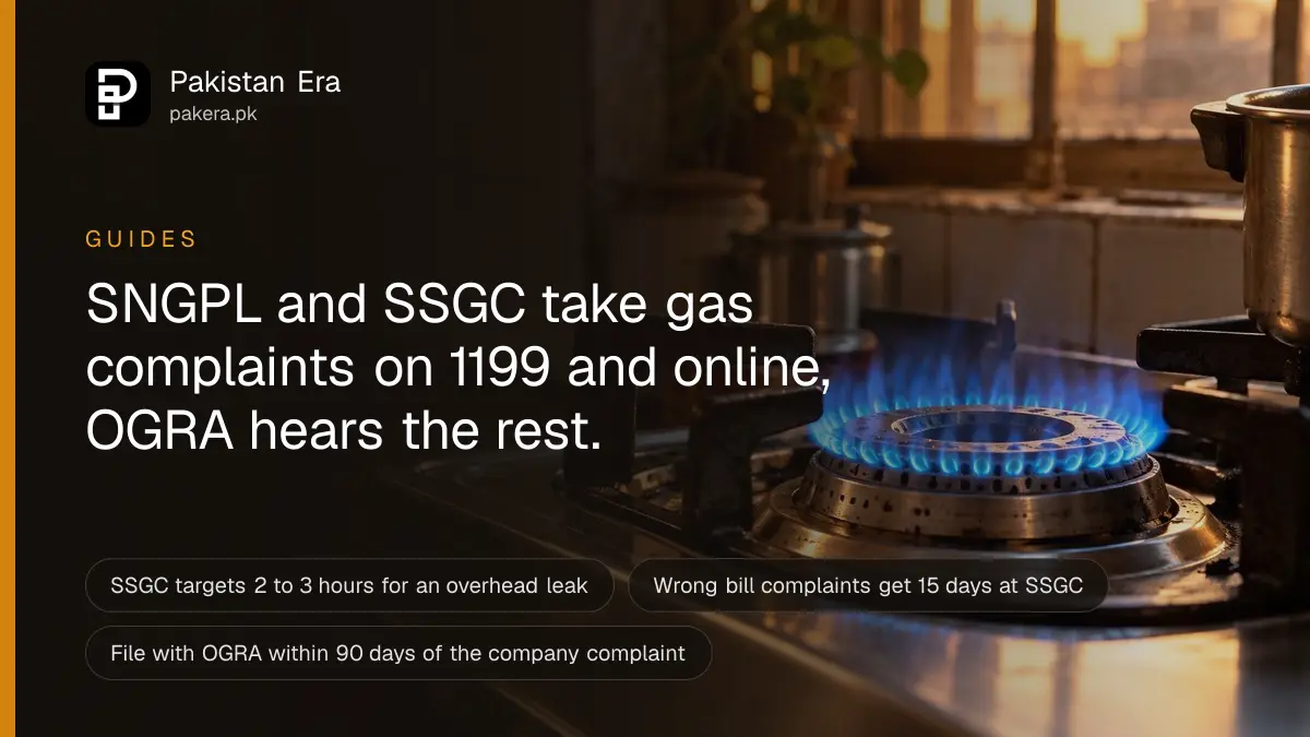 A blue gas flame burning on a steel kitchen stove in a home kitchen