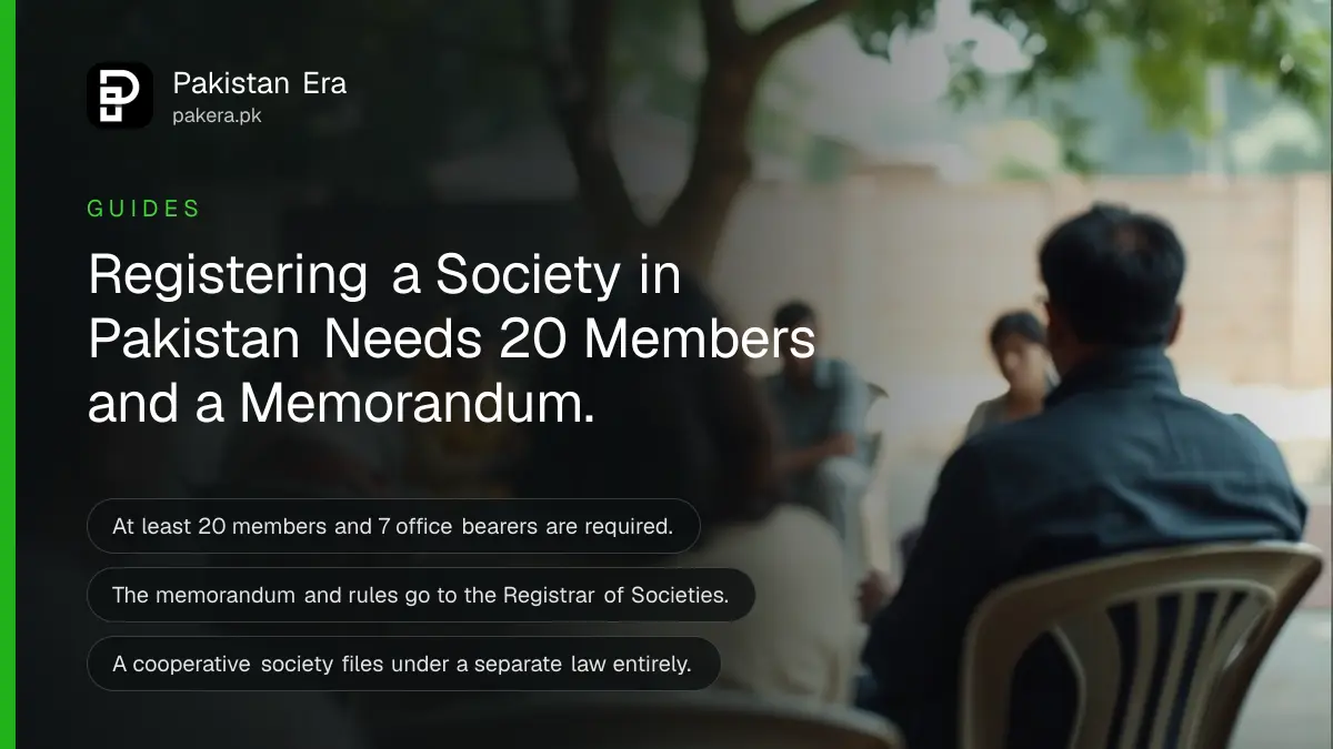 A small group sitting in a circle during an outdoor community planning meeting