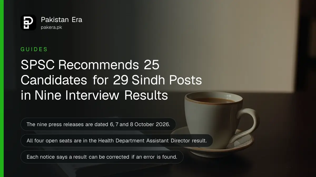 A cup of tea and a closed notebook on a wooden table, for a guide to SPSC interview results in Sindh