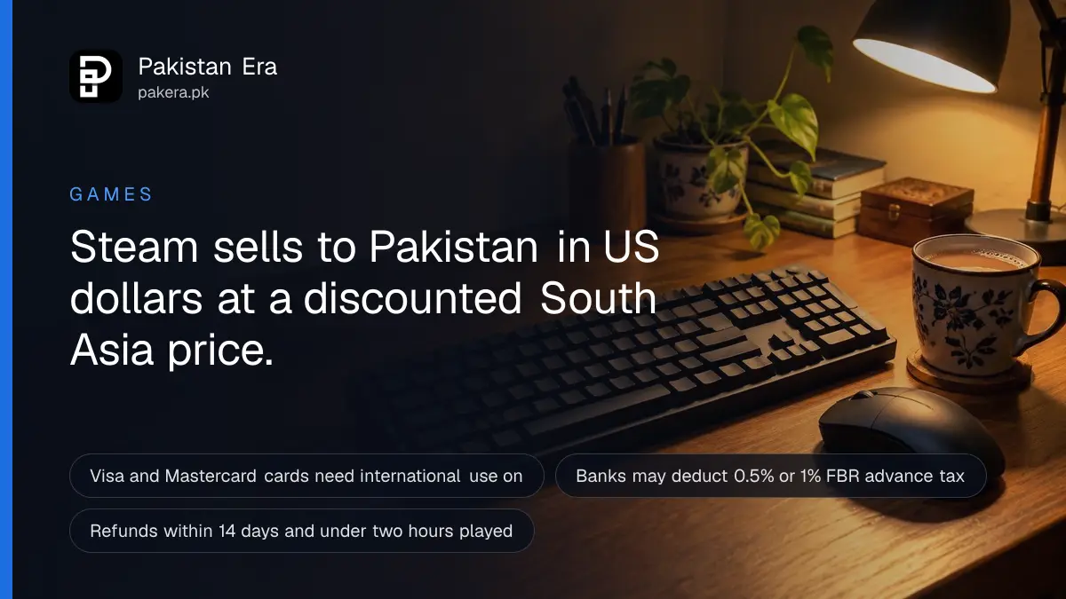 A PC keyboard and mouse on a wooden desk in a dim Lahore room lit by a warm desk lamp