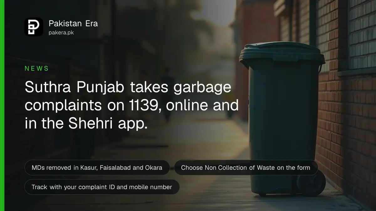 A clean, quiet residential street in Lahore at dawn with a green waste bin beside a brick wall
