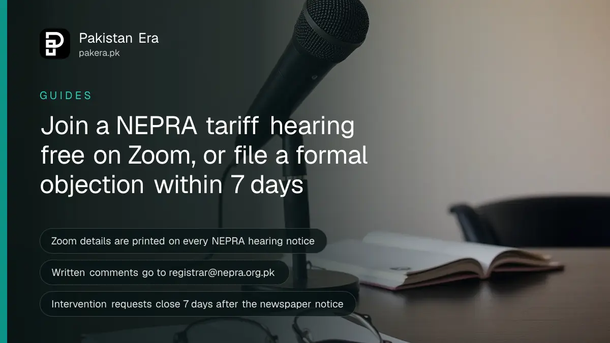 A desk microphone, a pair of reading glasses and a closed notebook on a dark wooden table