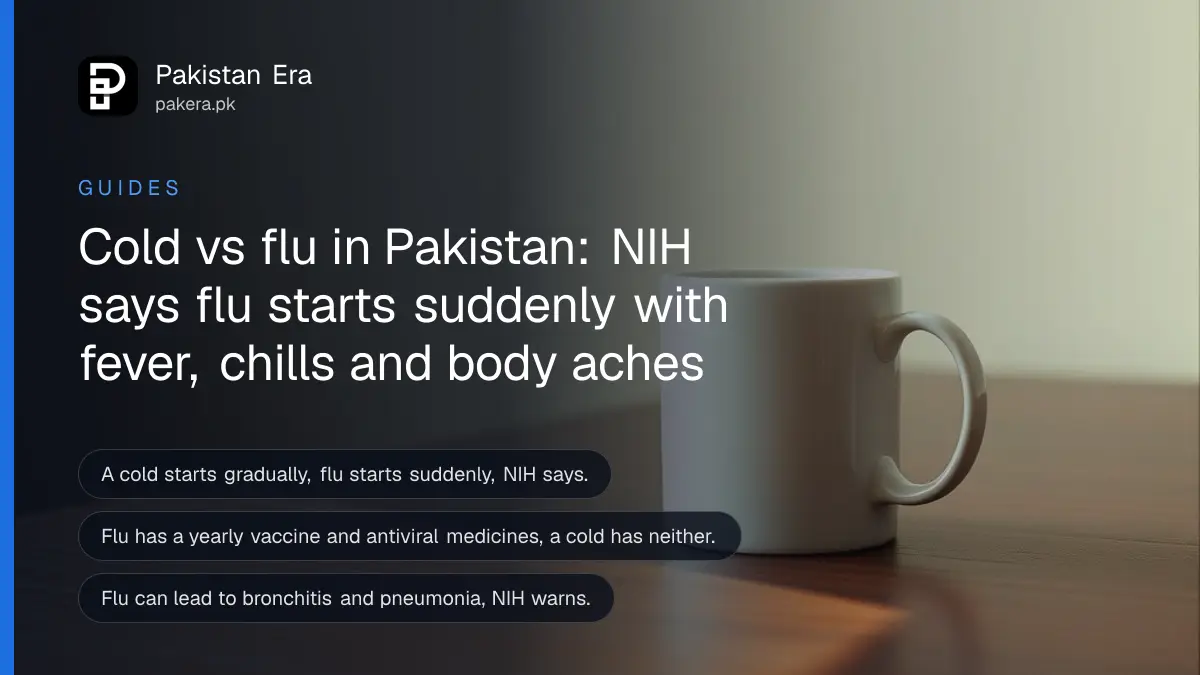A plain white mug on a dark wooden table against a cream wall, for a guide to telling a cold from flu in Pakistan