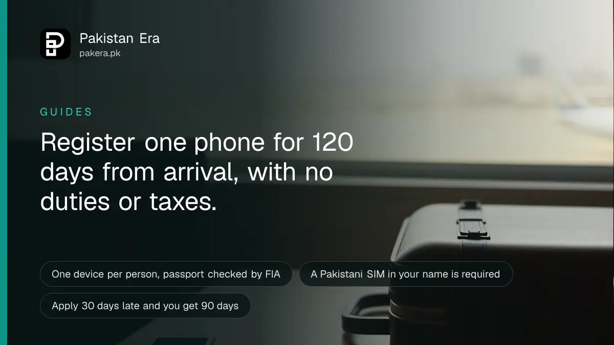 A traveller's smartphone and passport lying on a table beside a suitcase at an airport lounge