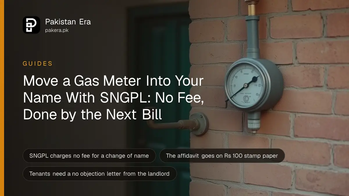 A gas meter and regulator on the outside wall of a brick house in a Punjab street