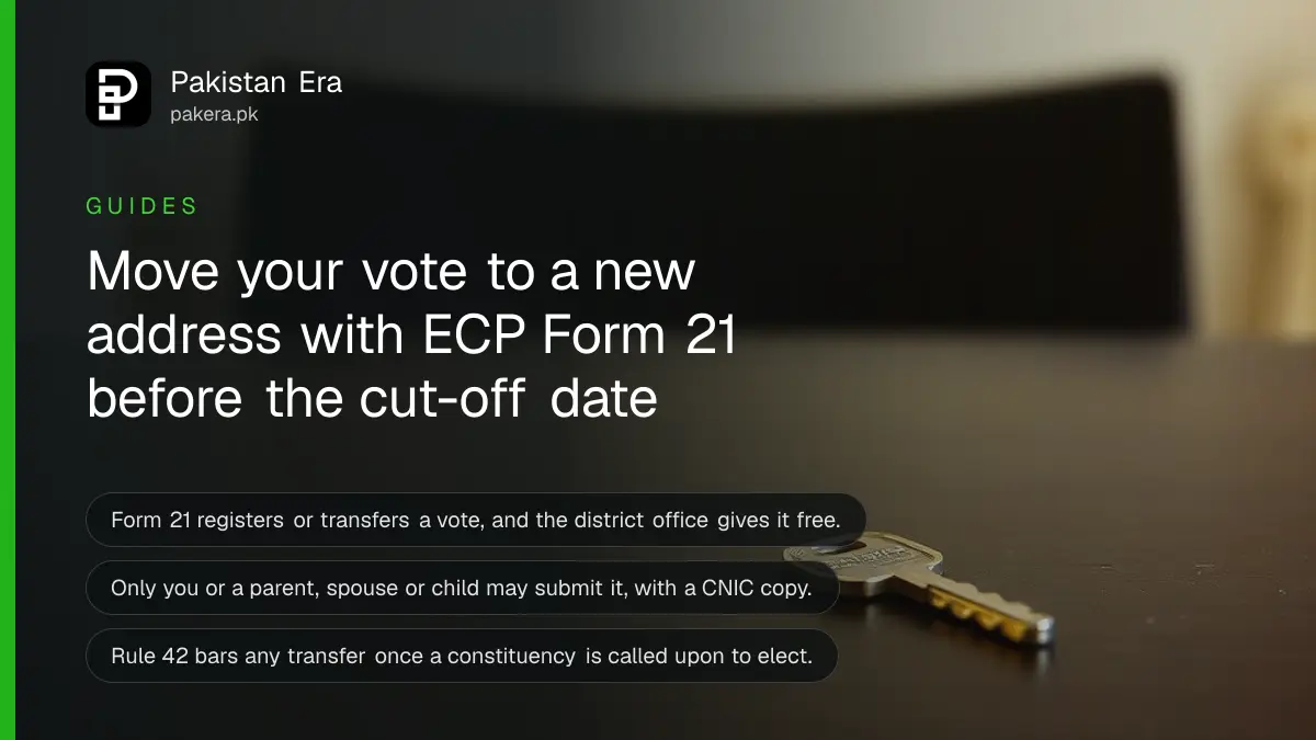 A brass key on a dark wooden table, for a guide on how to transfer your vote to a new address in Pakistan