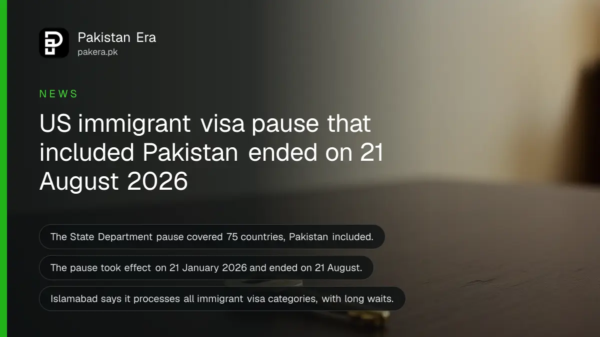 A brass key on a dark wooden table, for an article on the US immigrant visa pause for Pakistan