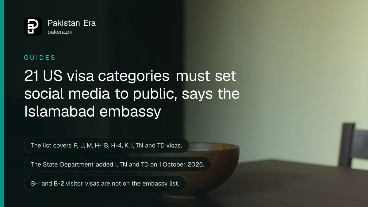 A wooden bowl on a dark wooden table, for an article on us visa social media public pakistan