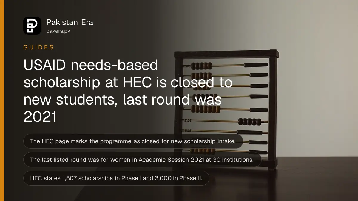 An abacus on a dark wooden table, for a guide to the closed USAID needs-based scholarship at HEC