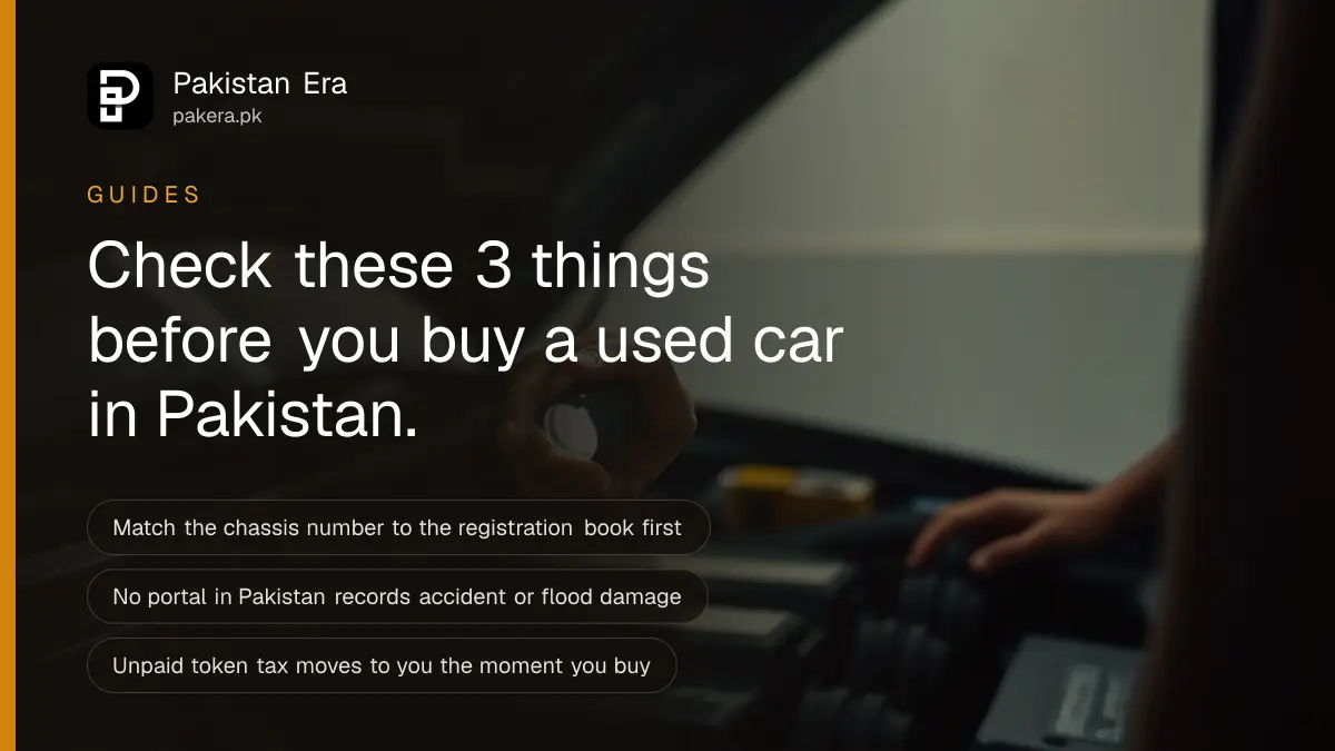 A buyer and a mechanic examining the engine bay of a used car during a pre-purchase inspection