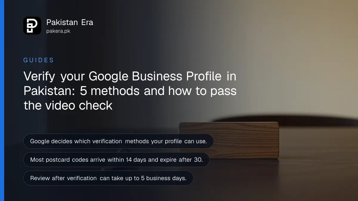 A brass key and a blank wooden sign on a dark table, for a guide to verifying a Google Business Profile in Pakistan
