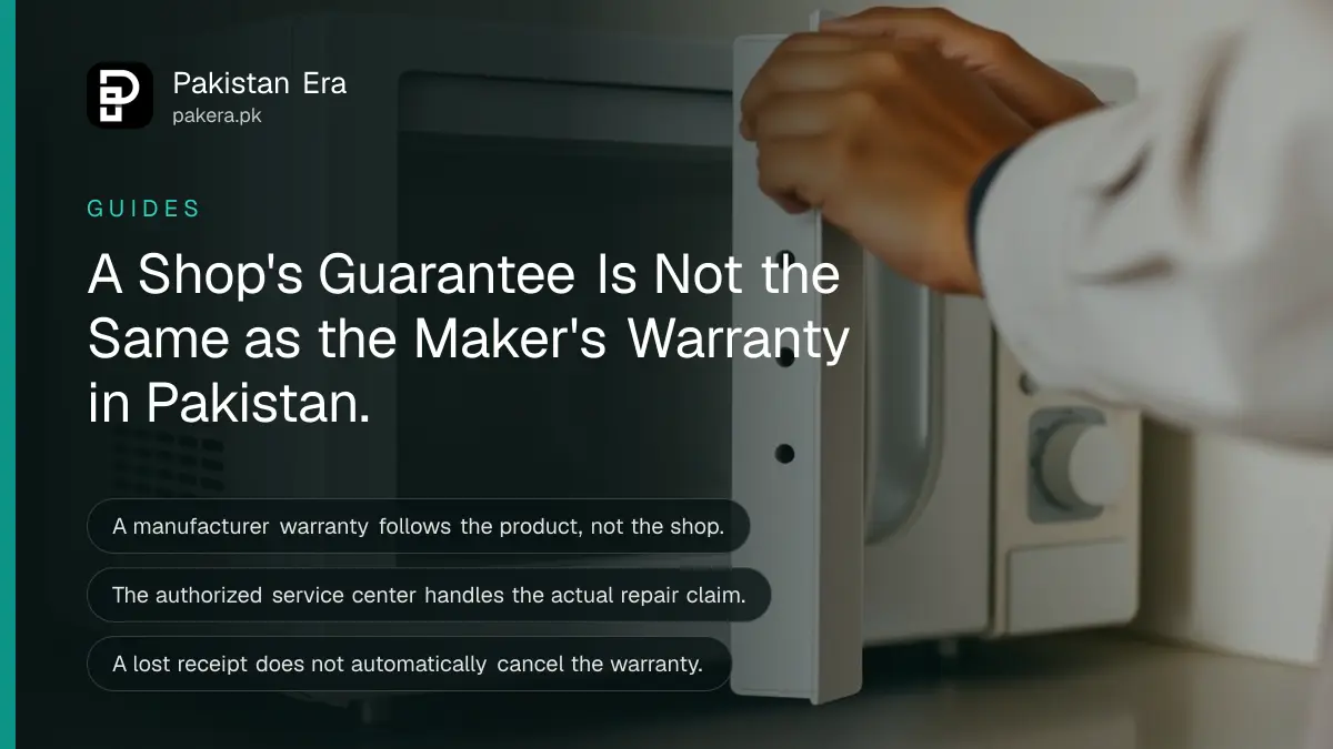 A technician's hands opening the back panel of a microwave oven on a service counter beside a warranty card and sales receipt