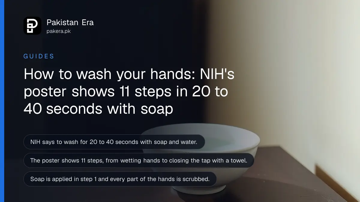 A plain white ceramic bowl of clear water on a dark wooden table against a cream wall, for a guide to NIH's hand washing steps
