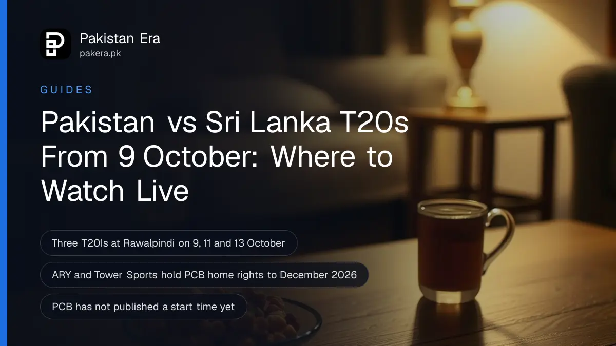 A family sofa and a cup of tea in a dim Rawalpindi living room lit by the glow of an evening cricket broadcast