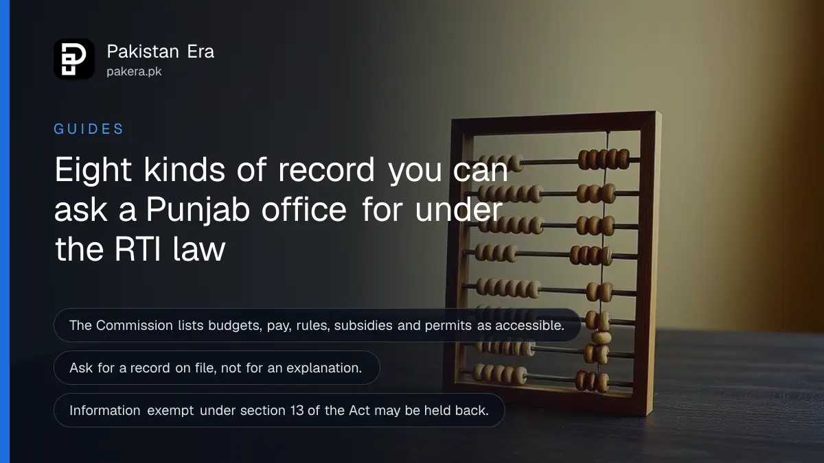 An abacus on a dark wooden table, for a guide on records you can request from Punjab offices