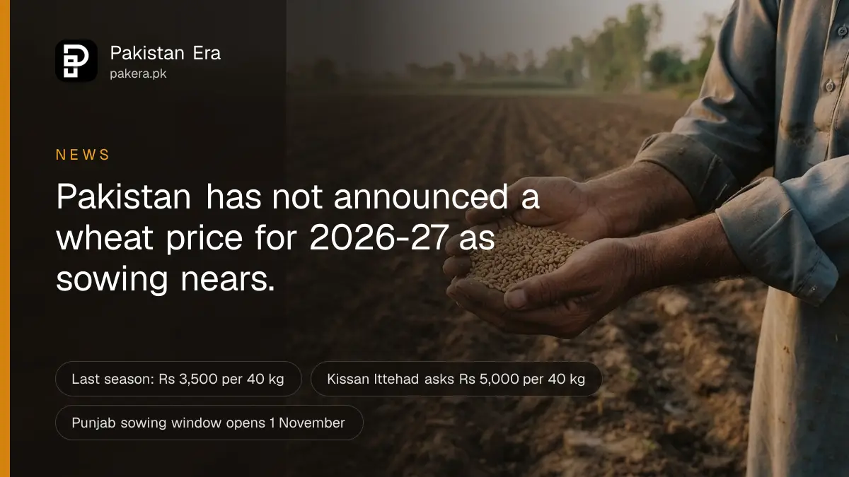 A farmer's cupped hands holding wheat seed above a freshly ploughed field in Punjab