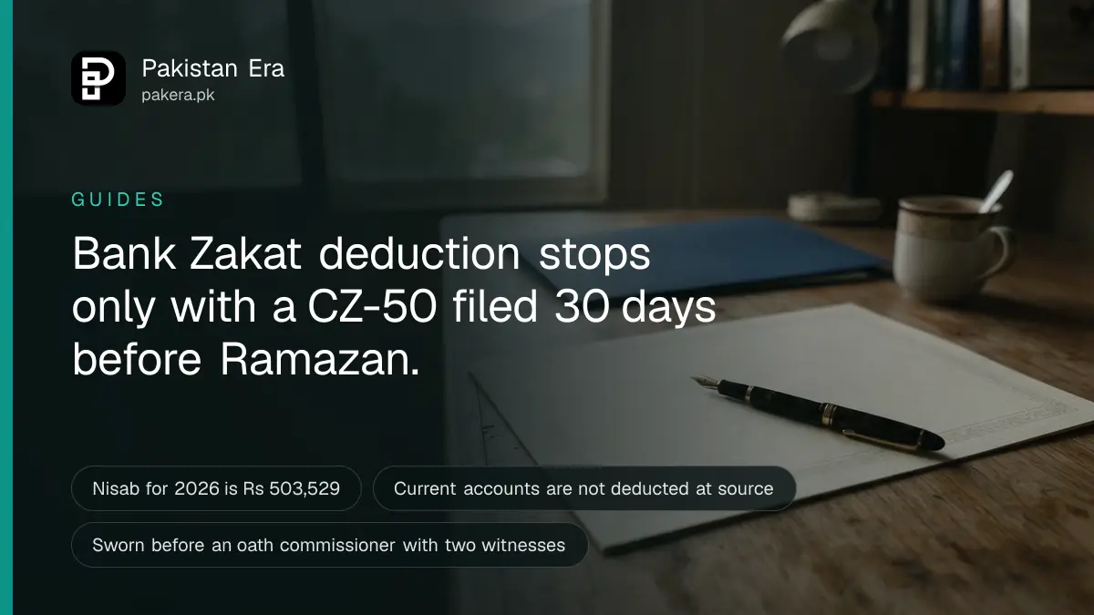 A pen resting on a blank sheet of paper on a wooden desk in an Islamabad office