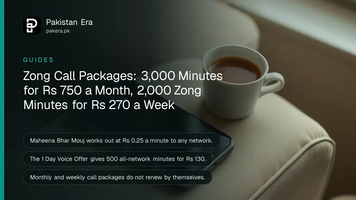 A smartphone lying face up on a sofa armrest with its screen dark, beside a cup of chai in afternoon light